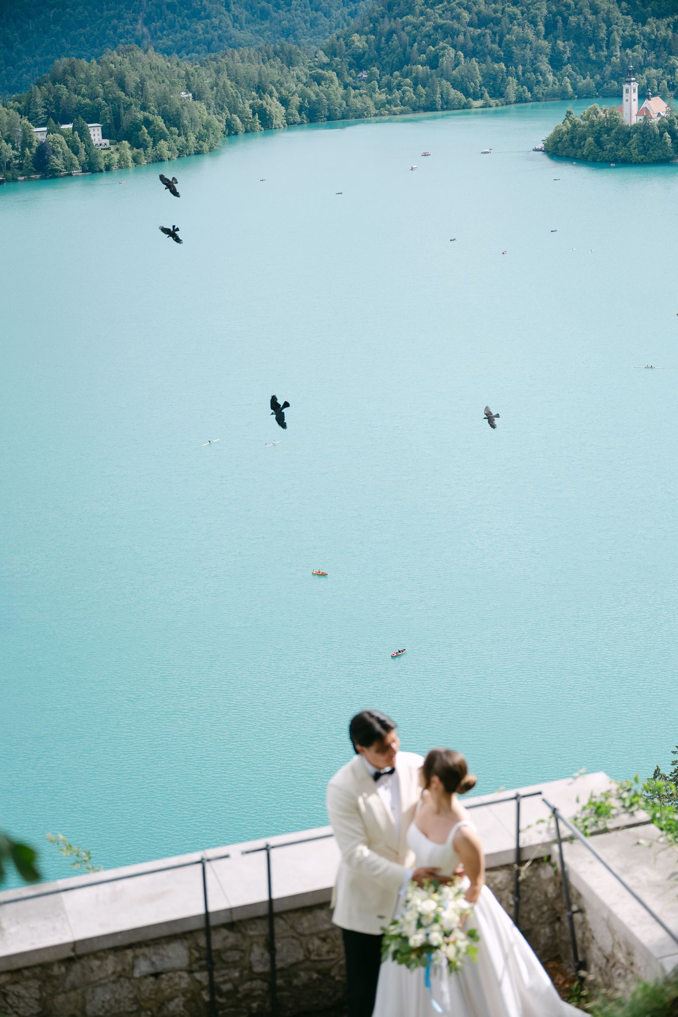Couple getting married at Bled castle overlooking Lake Bled